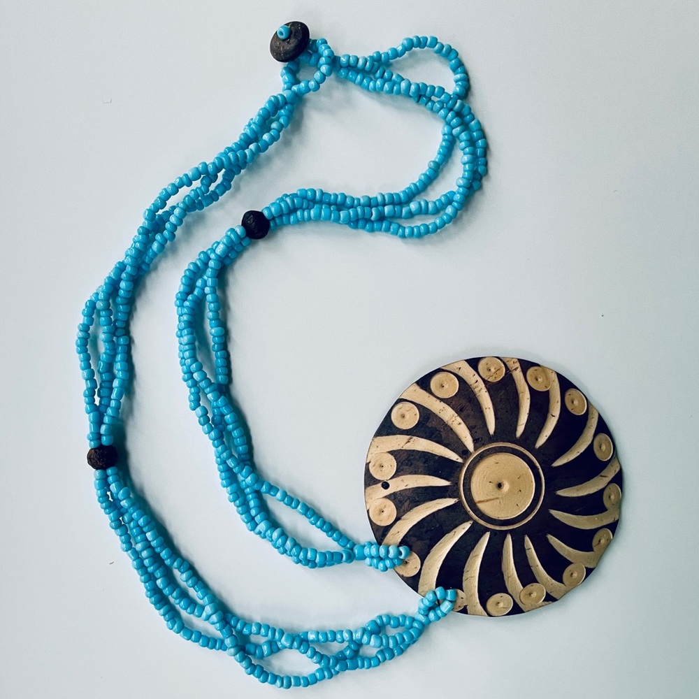 Mexican carved wood medallion w beautiful blue beaded necklace. EUC.